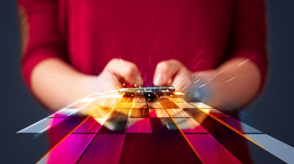 futuristic view of hands playing video console